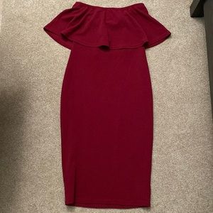 Wine color dress.